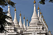 Myanmar - Mandalay, Sandamuni Pagoda. The entire ground is covered with 1749 small white pagodas with stone slabs with the Buddhist Tripitaka. 